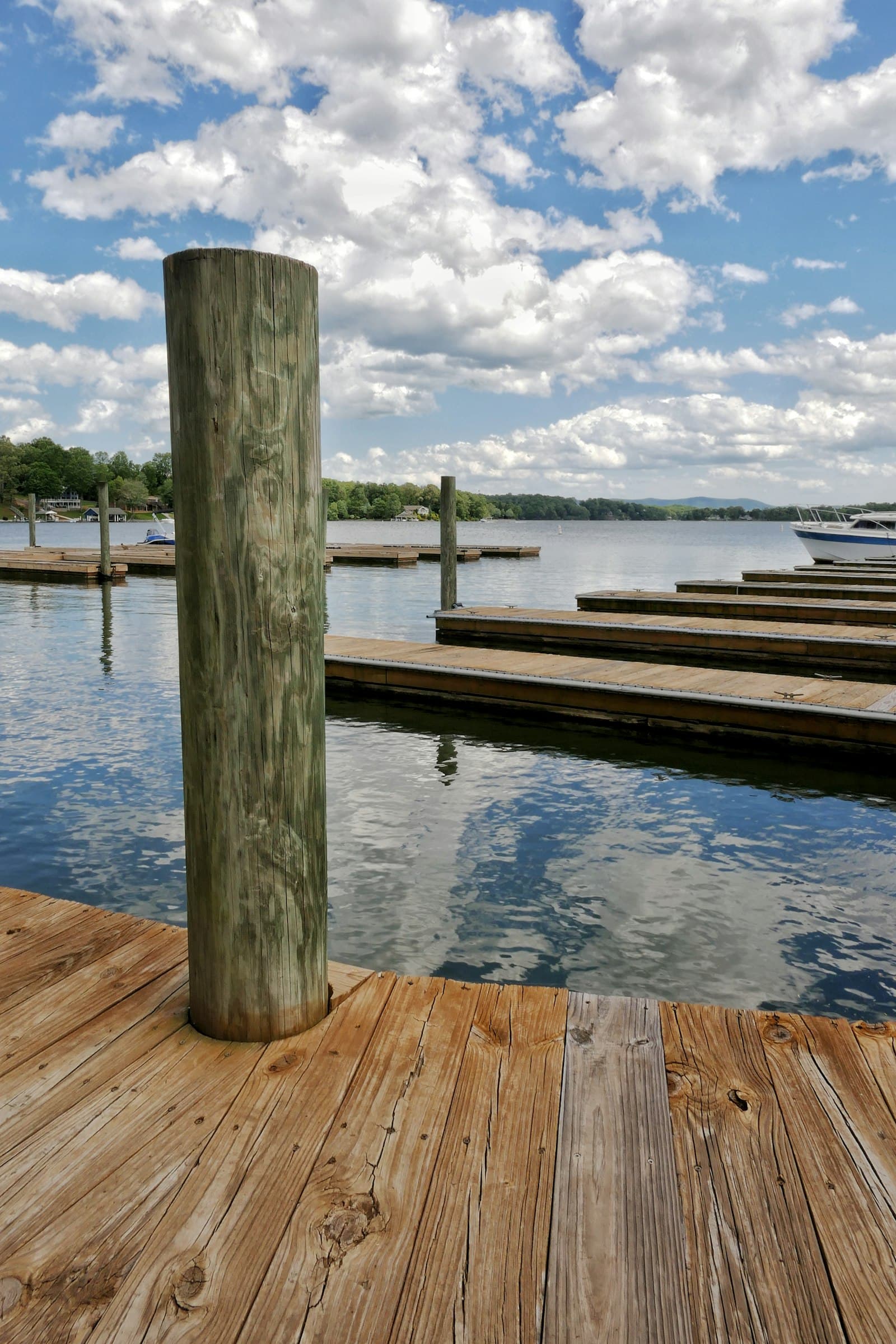 Wooden piers reaching into a still lake